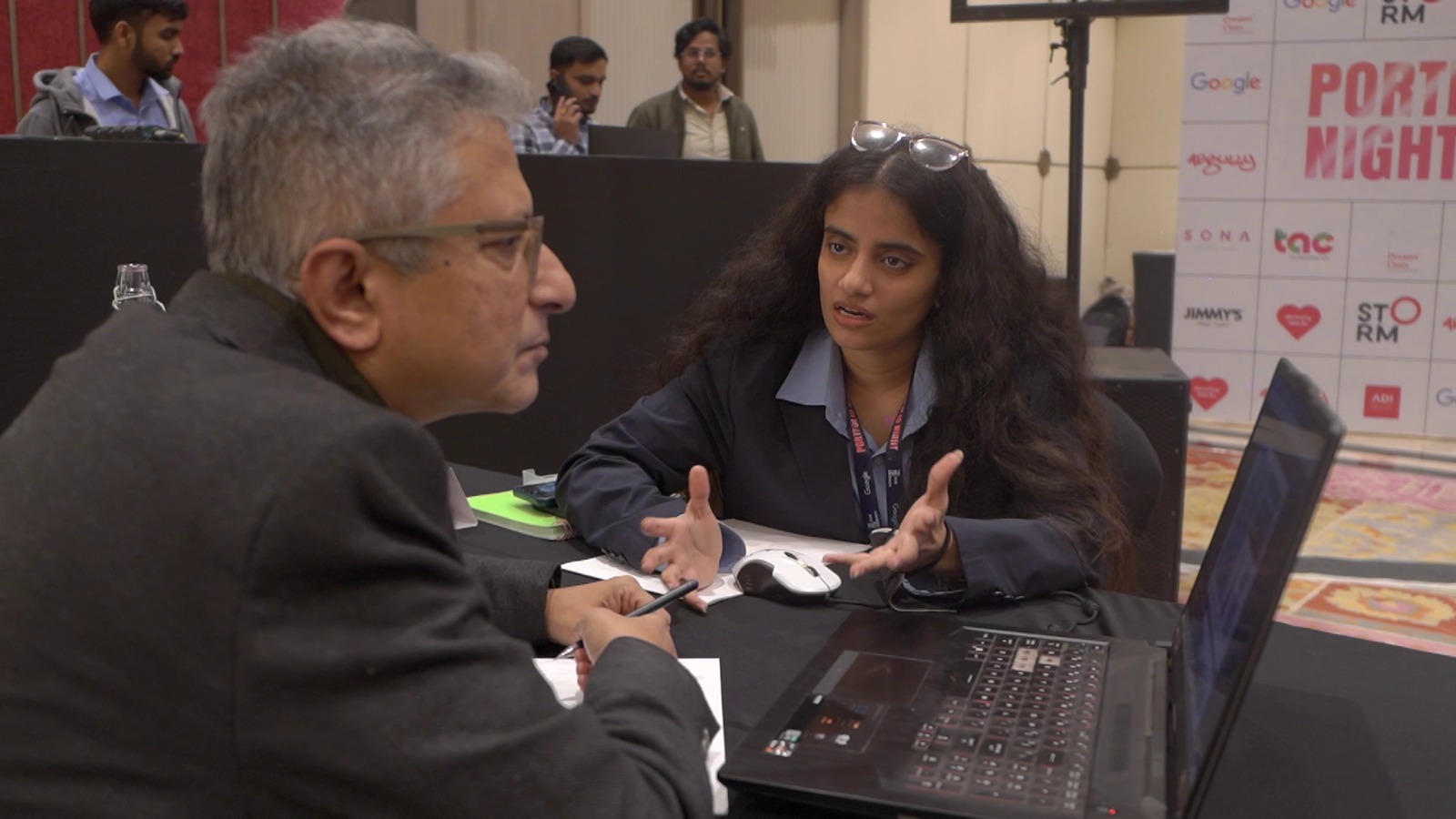 A creative presenting her portfolio at Portfolio Night Delhi 2025