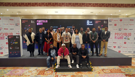 Reviewers and organisers on stage at Portfolio Night Delhi 2025